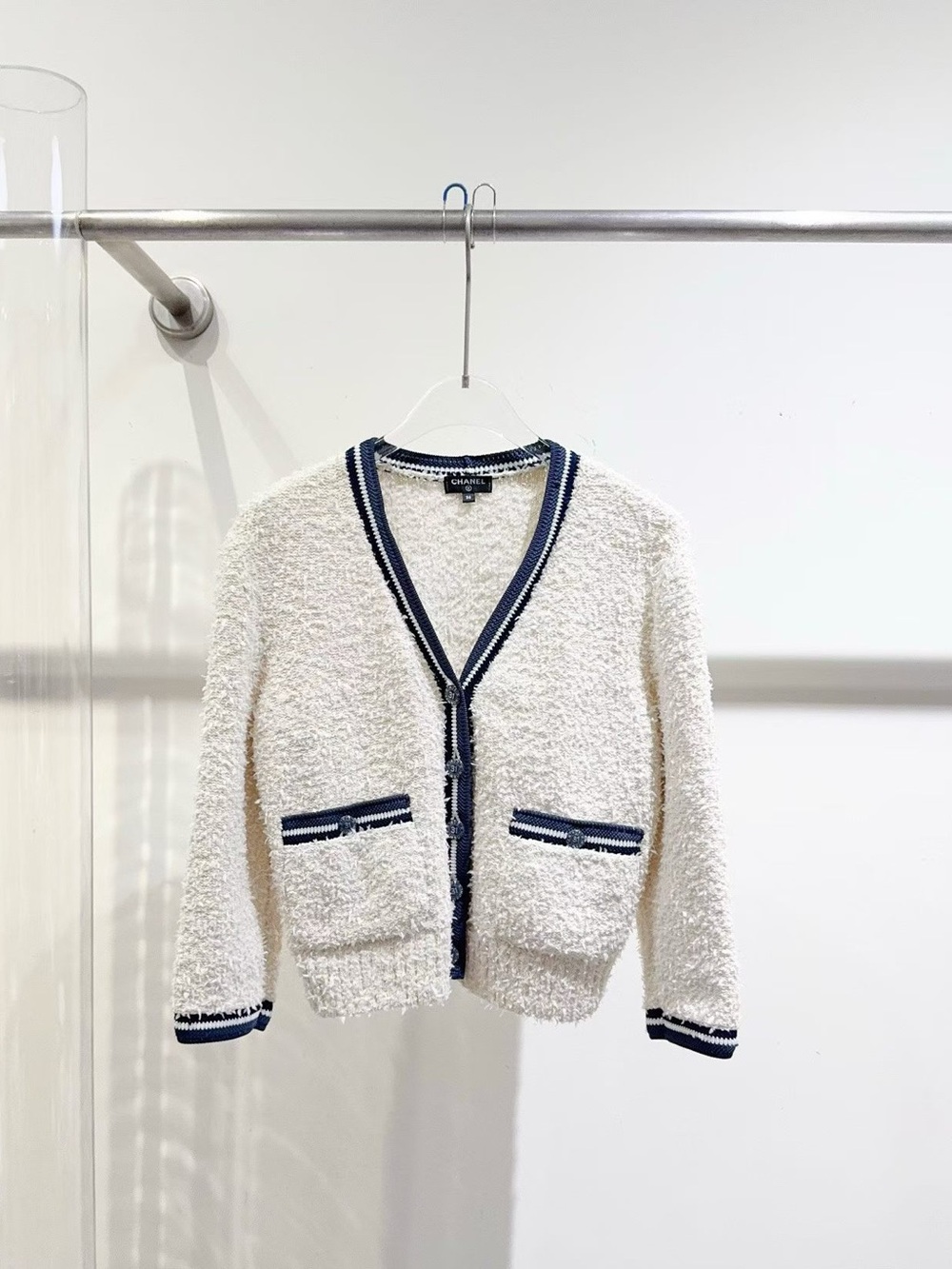 CHANEL Cream Bouclé Cardigan with Navy Trim